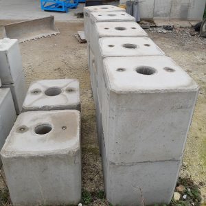 Massif béton provisoire pour poteau électrique